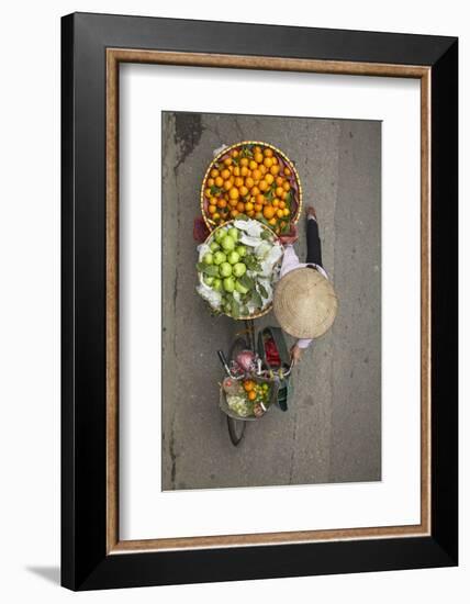 Street vendor with baskets of fruit on bicycle, Old Quarter, Hanoi, Vietnam-David Wall-Framed Photographic Print