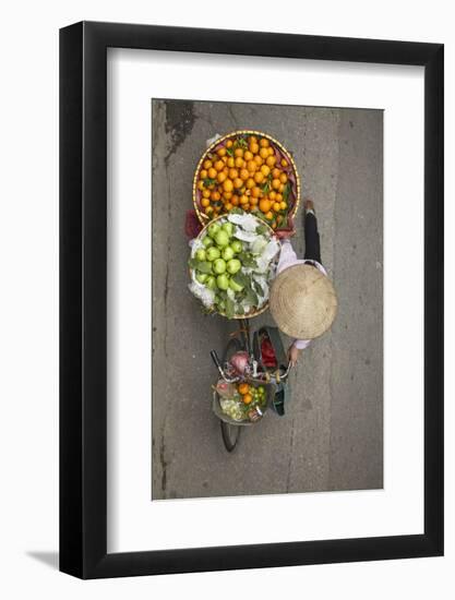 Street vendor with baskets of fruit on bicycle, Old Quarter, Hanoi, Vietnam-David Wall-Framed Photographic Print