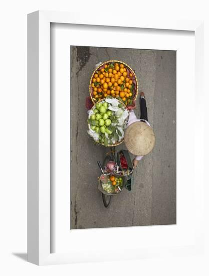 Street vendor with baskets of fruit on bicycle, Old Quarter, Hanoi, Vietnam-David Wall-Framed Photographic Print