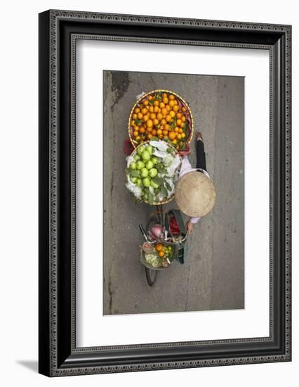 Street vendor with baskets of fruit on bicycle, Old Quarter, Hanoi, Vietnam-David Wall-Framed Photographic Print