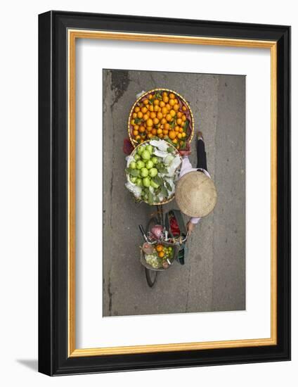 Street vendor with baskets of fruit on bicycle, Old Quarter, Hanoi, Vietnam-David Wall-Framed Photographic Print