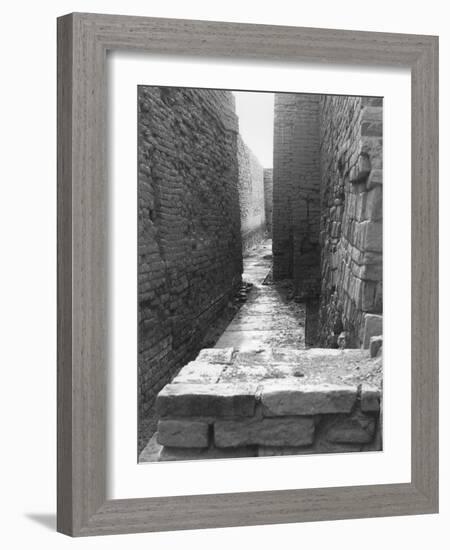 Street view in the residential district of Mohenjo Daro-Werner Forman-Framed Giclee Print