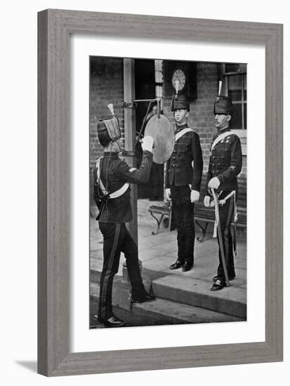 Striking the Gong at the Main Gate of the Aldershot Cavalry Barracks, Hampshire, 1896-Gregory & Co-Framed Giclee Print