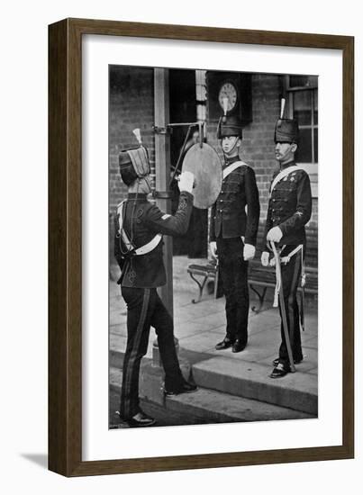 Striking the Gong at the Main Gate of the Aldershot Cavalry Barracks, Hampshire, 1896-Gregory & Co-Framed Giclee Print