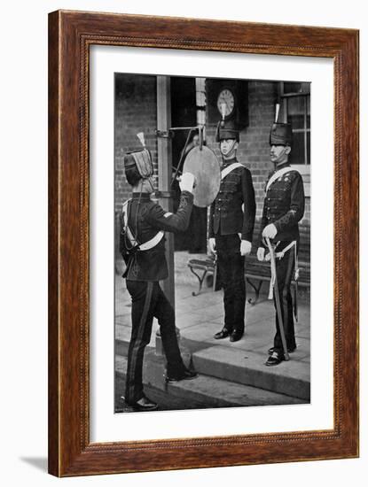 Striking the Gong at the Main Gate of the Aldershot Cavalry Barracks, Hampshire, 1896-Gregory & Co-Framed Giclee Print