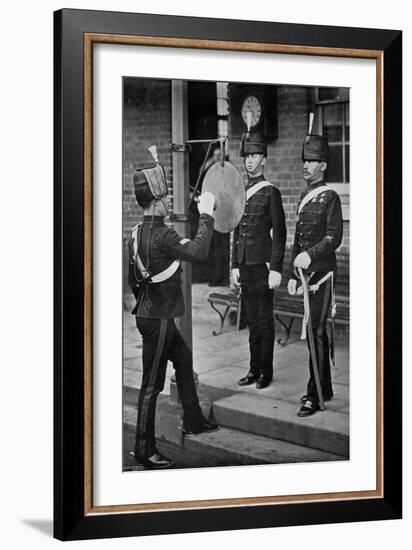 Striking the Gong at the Main Gate of the Aldershot Cavalry Barracks, Hampshire, 1896-Gregory & Co-Framed Giclee Print