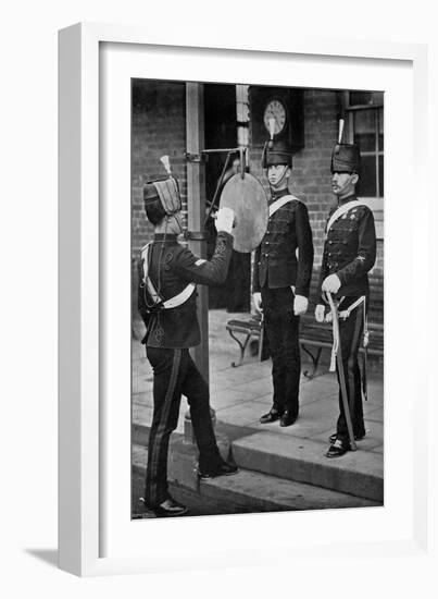 Striking the Gong at the Main Gate of the Aldershot Cavalry Barracks, Hampshire, 1896-Gregory & Co-Framed Giclee Print