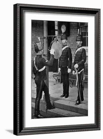 Striking the Gong at the Main Gate of the Aldershot Cavalry Barracks, Hampshire, 1896-Gregory & Co-Framed Giclee Print