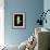 Stripy-Blue Fish-Framed Art Print displayed on a wall