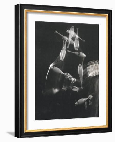 Stroboscopic Image of Juggler Stan Cavenaugh Juggling Tenpins-Gjon Mili-Framed Photographic Print