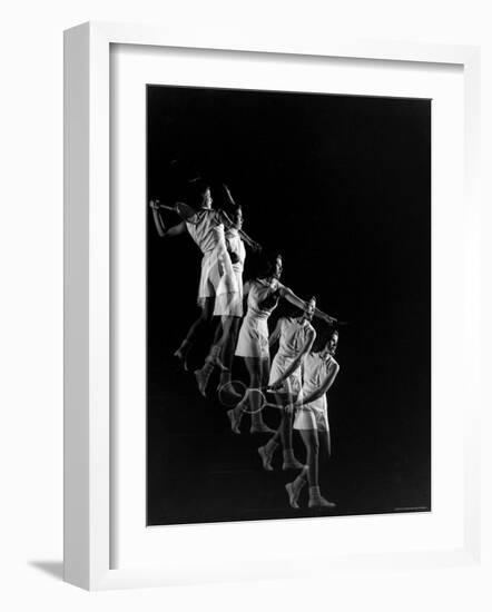 Stroboscopic Image of Woman Swinging Tennis Racquet as She Appears to Be Descending Staircase-Gjon Mili-Framed Photographic Print