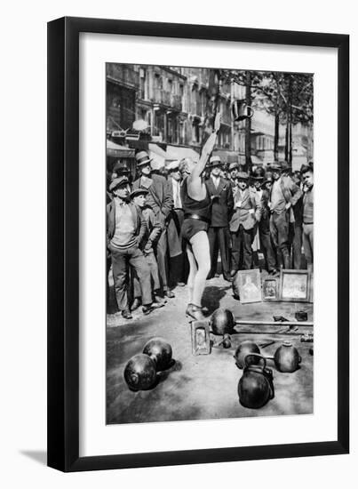Strongman Juggling with Weights, Paris, 1931-Ernest Flammarion-Framed Giclee Print