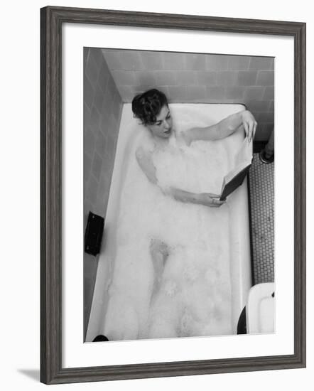 Student Vera Bogach of Massachusetts College, Studying for Exams in a Bubble Bath-Yale Joel-Framed Photographic Print