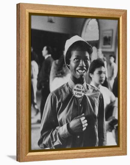 Student Wearing Hat and Button on Shirt That Says: All I Want is Love on "Old Clothes Day"-Gordon Parks-Framed Premier Image Canvas