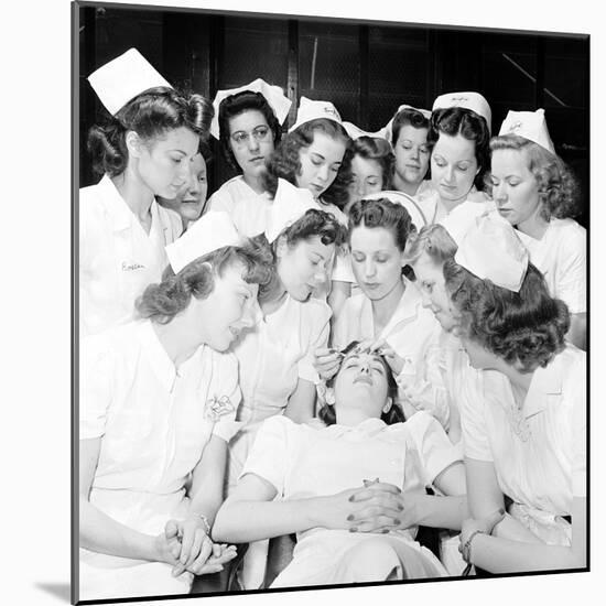 Students at Beauty School Learning Eye Brow and Make Up Techniques. 1940S-Nina Leen-Mounted Photographic Print