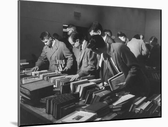 Students Buying Books at a Sale at Harvard University-Dmitri Kessel-Mounted Photographic Print