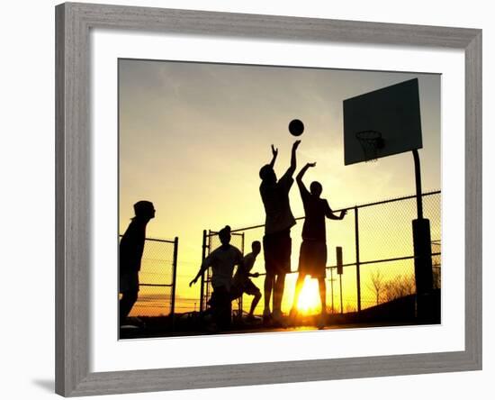 Students Play a Basketball Game as the Sun Sets at Bucks County Community College-null-Framed Photographic Print