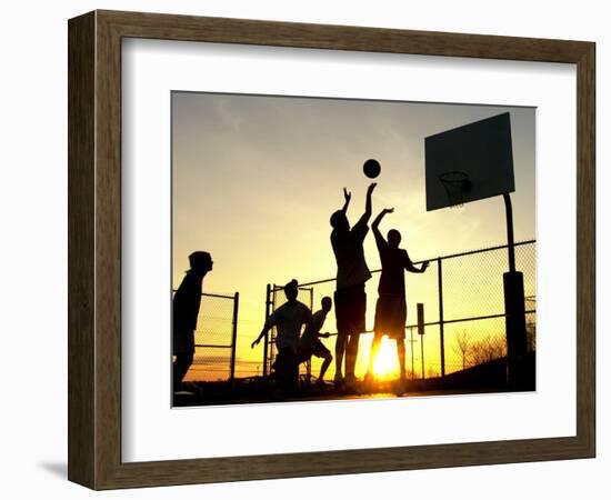 Students Play a Basketball Game as the Sun Sets at Bucks County Community College-null-Framed Photographic Print