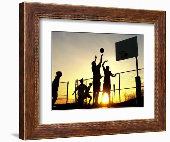 Students Play a Basketball Game as the Sun Sets at Bucks County Community College-null-Framed Photographic Print