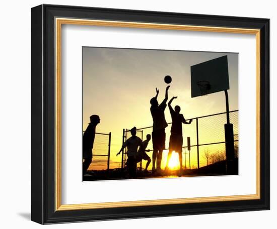 Students Play a Basketball Game as the Sun Sets at Bucks County Community College-null-Framed Photographic Print