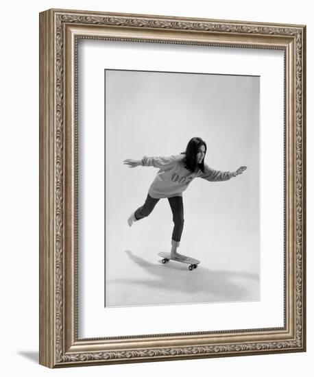 Studio Photos of Gloria Steinem Riding a Skateboard with a 007 James Bond Sweatshirt, 1965-Yale Joel-Framed Photographic Print