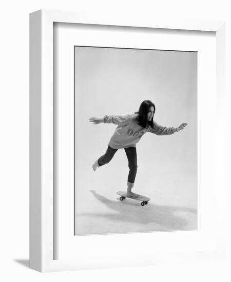 Studio Photos of Gloria Steinem Riding a Skateboard with a 007 James Bond Sweatshirt, 1965-Yale Joel-Framed Photographic Print