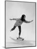 Studio Photos of Gloria Steinem Riding a Skateboard with a 007 James Bond Sweatshirt, 1965-Yale Joel-Mounted Photographic Print