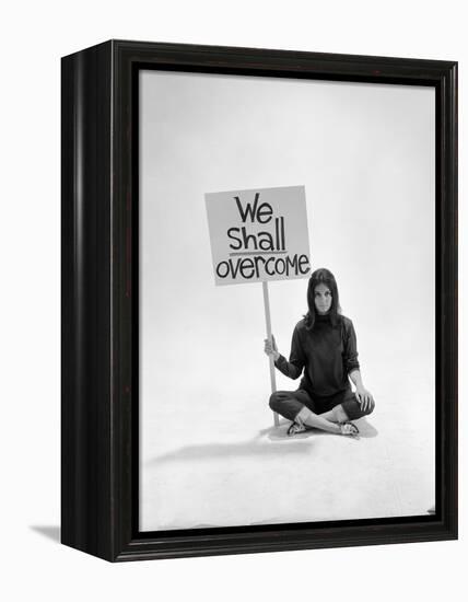 Studio Photos of Gloria Steinem Sitting on Floor with Sign That Says 'We Shall Overcome", 1965-Yale Joel-Framed Premier Image Canvas