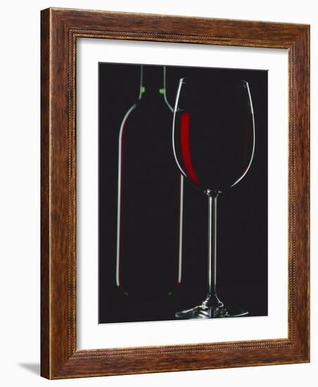 Studio Shot of Back-Lit Glass and Bottle of Red Wine-Lee Frost-Framed Photographic Print