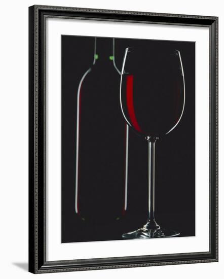 Studio Shot of Back-Lit Glass and Bottle of Red Wine-Lee Frost-Framed Photographic Print