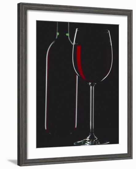 Studio Shot of Back-Lit Glass and Bottle of Red Wine-Lee Frost-Framed Photographic Print