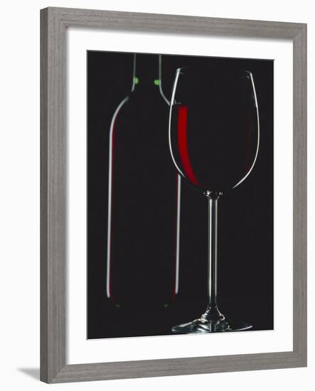 Studio Shot of Back-Lit Glass and Bottle of Red Wine-Lee Frost-Framed Photographic Print