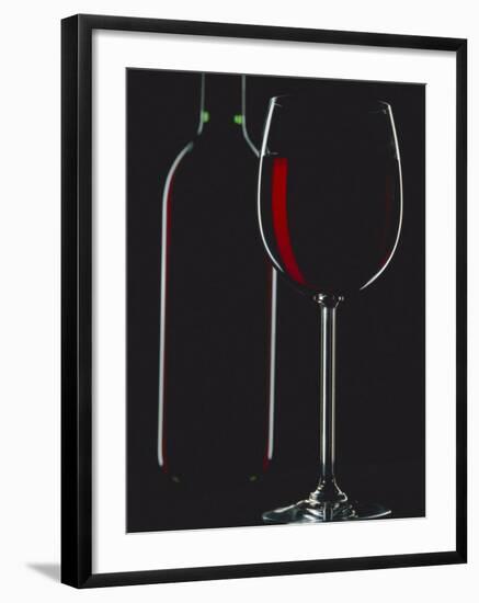 Studio Shot of Back-Lit Glass and Bottle of Red Wine-Lee Frost-Framed Photographic Print