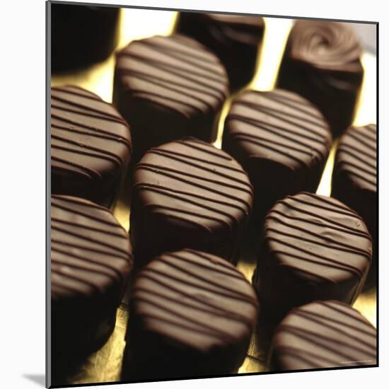Studio Shot of Chocolates-John Miller-Mounted Photographic Print