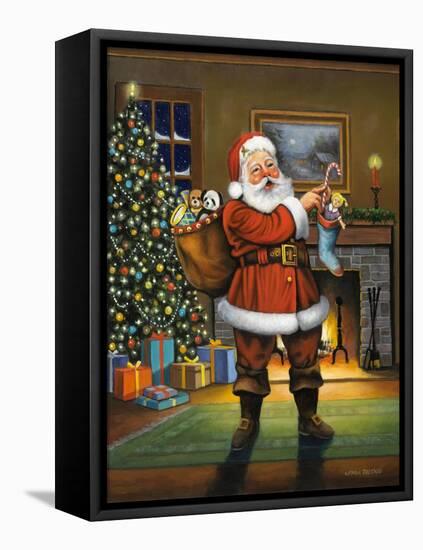 Stuffing the Stockings-John Zaccheo-Framed Premier Image Canvas