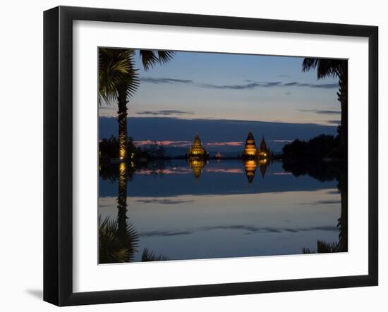 Stupas illuminated at night near infinity pool of Aureum Palace Hotel, Bagan, Mandalay Region, M...-null-Framed Photographic Print