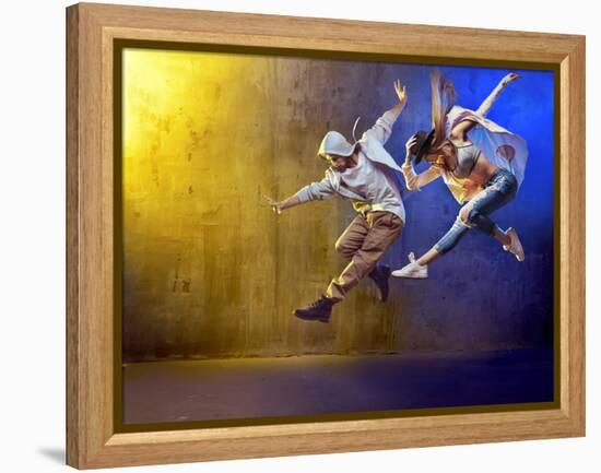 Stylish Dancers Dancing in a Concrete Place-Konrad B?k-Framed Premier Image Canvas