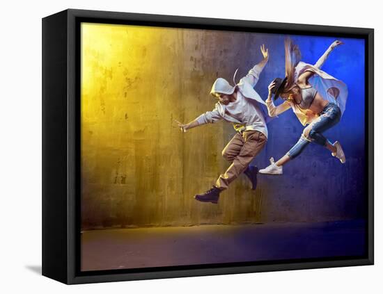 Stylish Dancers Dancing in a Concrete Place-Konrad B?k-Framed Premier Image Canvas