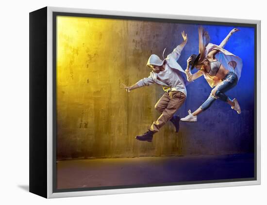 Stylish Dancers Dancing in a Concrete Place-Konrad B?k-Framed Premier Image Canvas