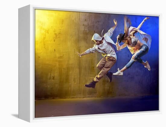 Stylish Dancers Dancing in a Concrete Place-Konrad B?k-Framed Premier Image Canvas