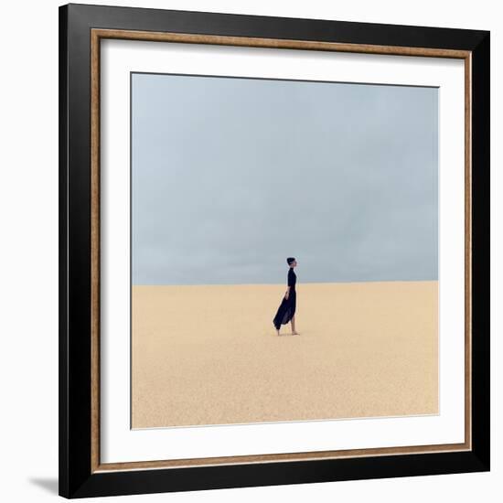 Stylish Girl in Black Clothes Walking in the Desert-Evgeniya Porechenskaya-Framed Photographic Print