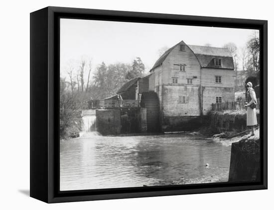 Stylish Woman Well Wrapped up for a Cold Day Stops to Admire Castle Mill Dorking Surrey England-null-Framed Stretched Canvas