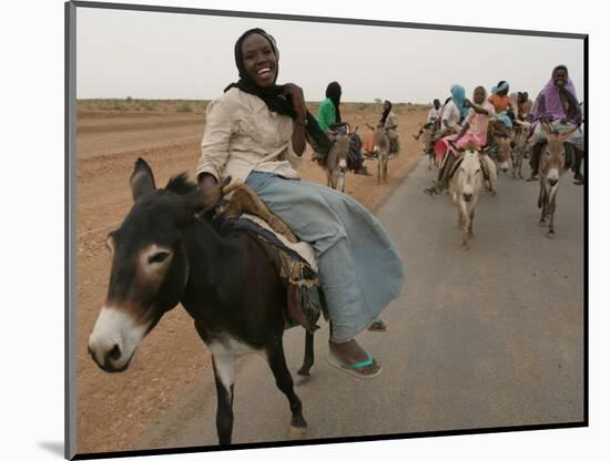 Sudanese Women Ride Donkeys at the Entrance of the Zamzam Refugee Camp-null-Mounted Photographic Print