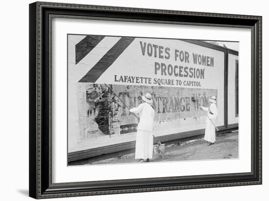 Suffragettes Uses Long Brushes To Post a Billboard Announcing a "Votes" For Women" Parade-null-Framed Art Print