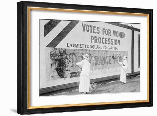 Suffragettes Uses Long Brushes To Post a Billboard Announcing a "Votes" For Women" Parade-null-Framed Art Print