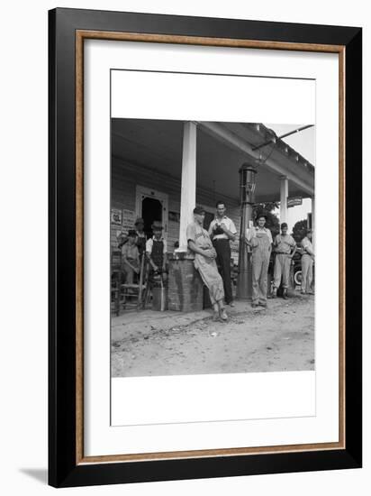 Suiting Up for Baseball at the Gasoline Station-Dorothea Lange-Framed Art Print