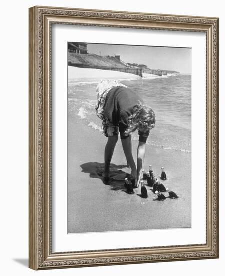 Summer at Cape Cod: Bottles of Coca Cola Buried in the Surf to Keep Them Cool-Alfred Eisenstaedt-Framed Photographic Print