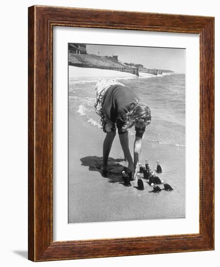 Summer at Cape Cod: Bottles of Coca Cola Buried in the Surf to Keep Them Cool-Alfred Eisenstaedt-Framed Photographic Print