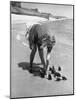 Summer at Cape Cod: Bottles of Coca Cola Buried in the Surf to Keep Them Cool-Alfred Eisenstaedt-Mounted Photographic Print