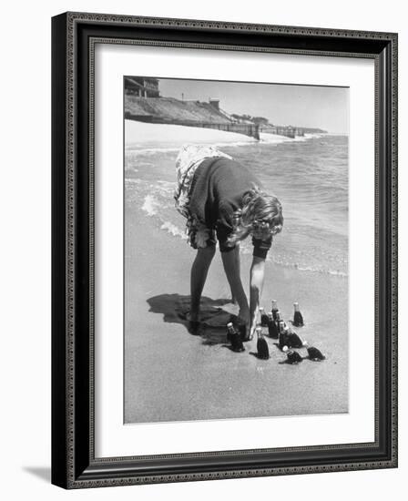 Summer at Cape Cod: Bottles of Coca Cola Buried in the Surf to Keep Them Cool-Alfred Eisenstaedt-Framed Photographic Print